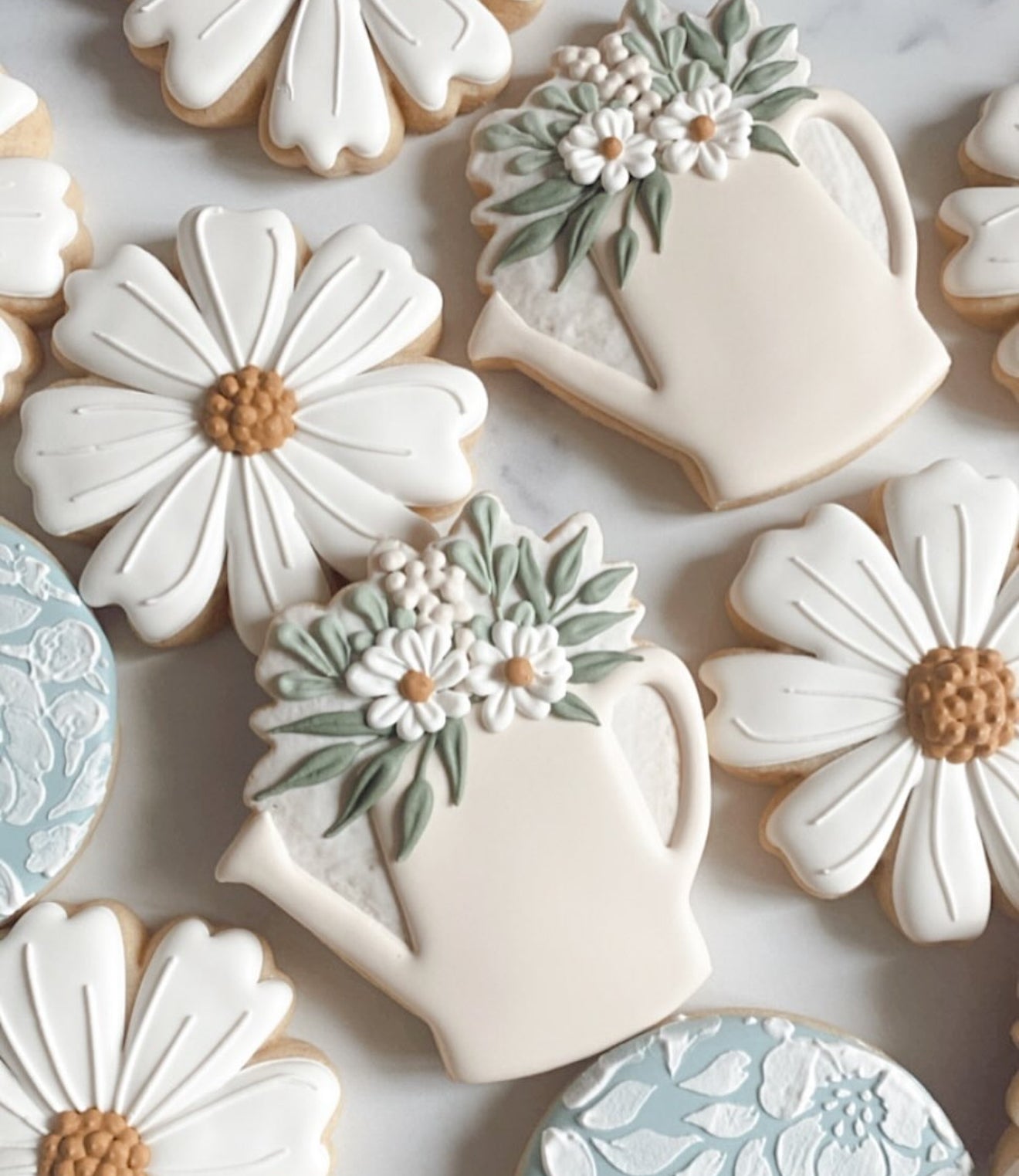 Watering can with floral cookie cutter