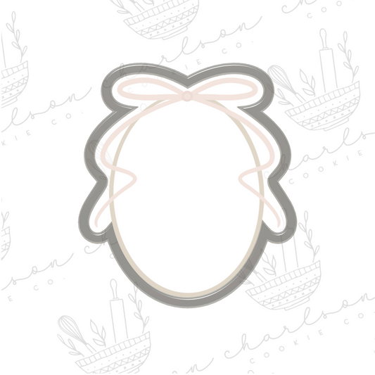 Oval with ribbon bow plaque cookie cutter