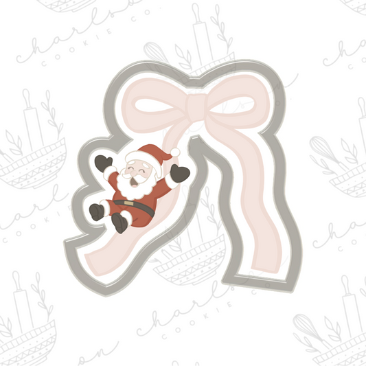 Ribbon slide Santa cookie cutter (blooming.bakes)